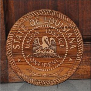 The Laser Engraved Wood State Seal features Louisiana’s seal, a pelican, "Union, Justice, Confidence," and rope accents.