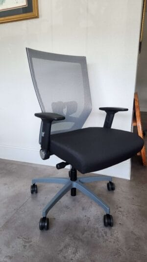 The Eclipse II Plus High Back Task Chair features a black mesh back, black seat, adjustable arms, and a gray base with five casters.