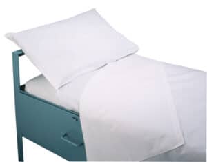 Muslin Pillow Cases shown on a hospital bed with metal frame, white sheet, and blanket, set against a plain white background.
