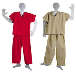 Two mannequins display loose-fitting V-neck scrub sets with short sleeves and Twill Scrub Pants, one red and one beige.